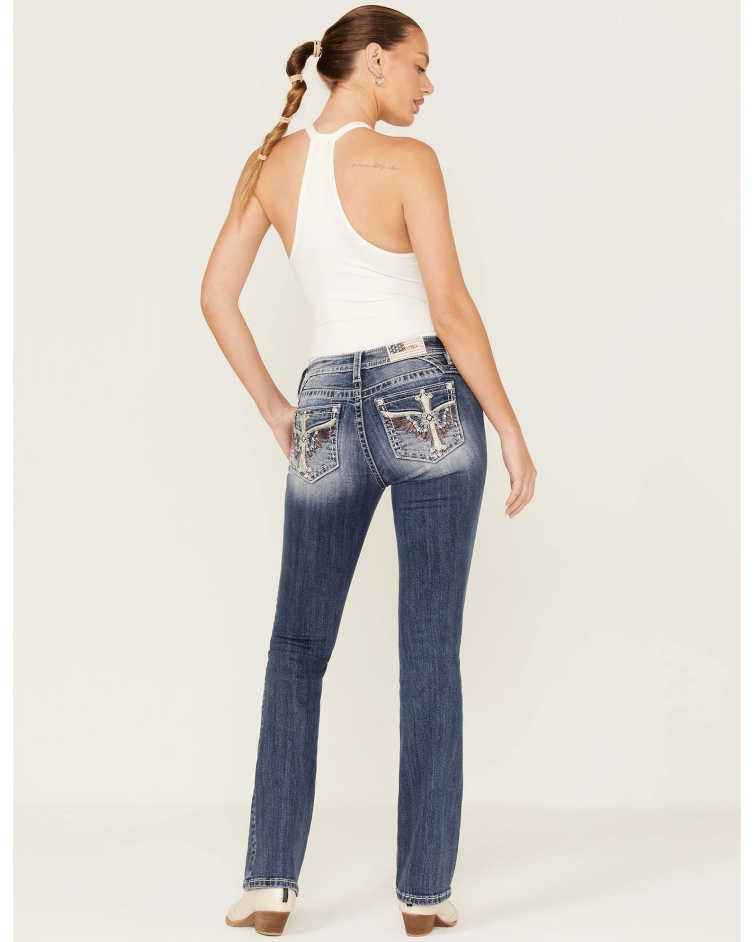 Miss Me Women's Medium Wash Mid Rise Americana Wing Cross Rhinestone Bootcut Jeans